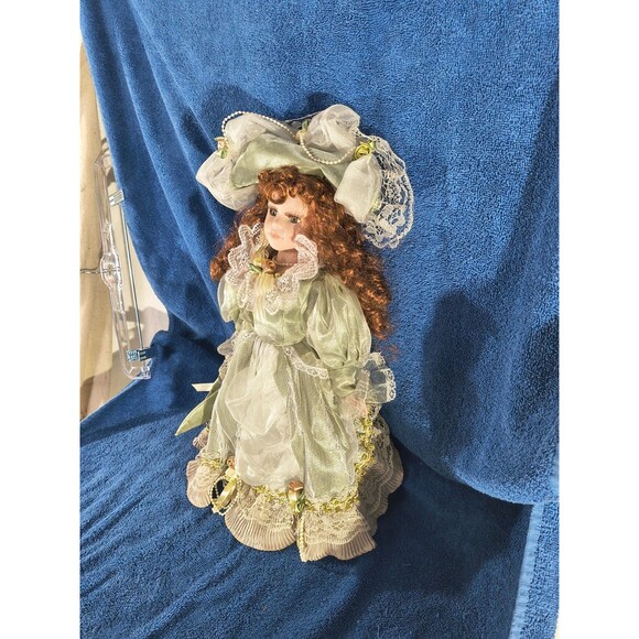Cathay Collection Victorian Style Porcelain Doll with Green Dress and Hat - Picture 4 of 7